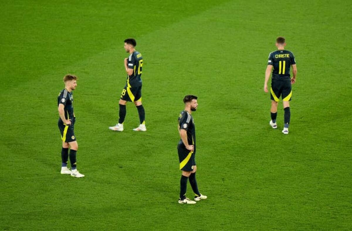 Scotland players dejected after the final whistle