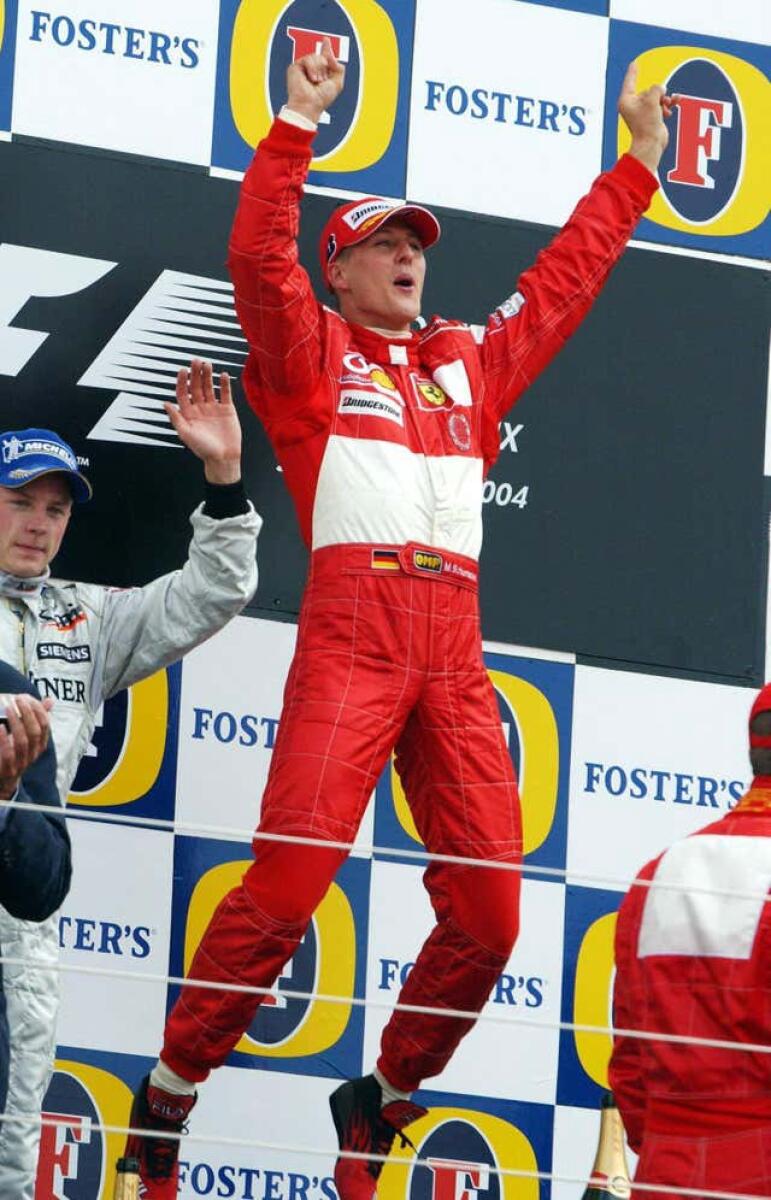 Ferrari’s Michael Schumacher celebrates after winning the British Grand Prix (Rui Vieira/PA)