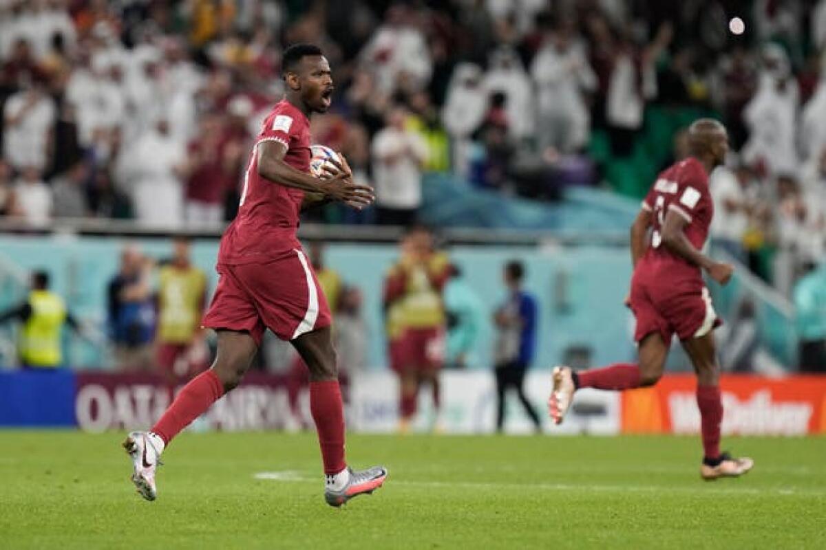 Mohammed Muntari celebrates after his second-half header gave Qatar hope of a fightback
