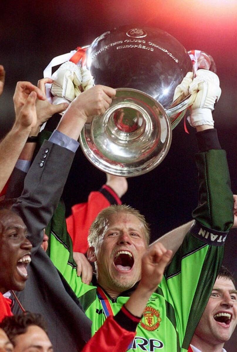 Peter Schmeichel lifts the Champions League in 1999