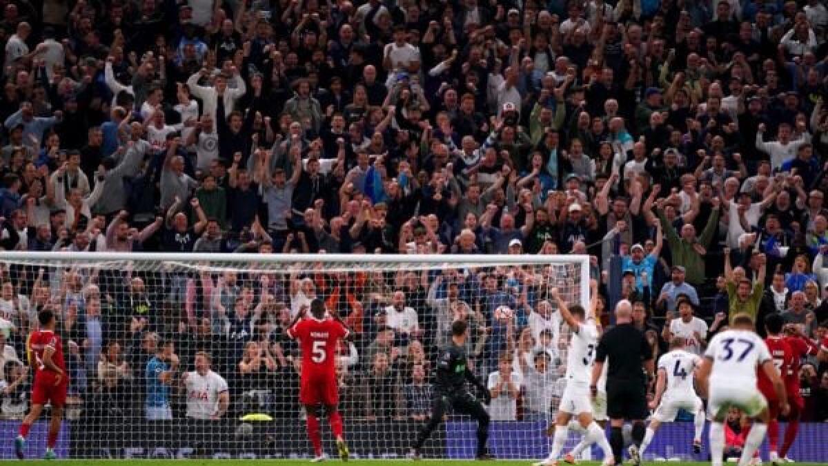 Tottenham claim dramatic last-gasp victory over nine-man Liverpool