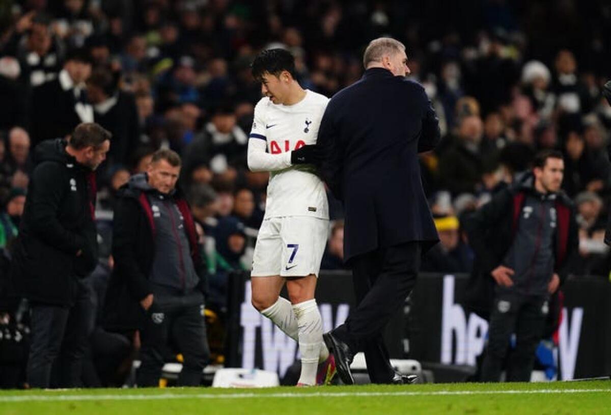 Son was forced off in the 88th minute with a back injury