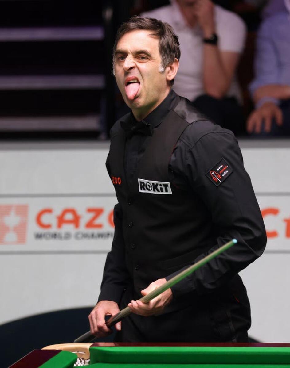 Ronnie O'Sullivan reacts during his match with Hossein Vafaei 