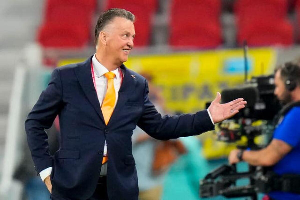 Louis van Gaal smiles prior to the start of the match 