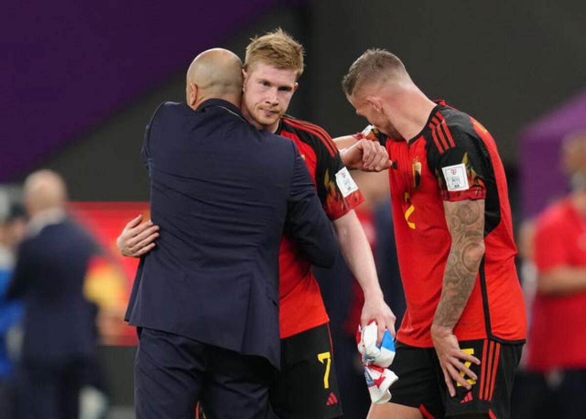 Martinez consoles Kevin De Bruyne after Belgium's 0-0 draw with Croatia signalled their World Cup exit 