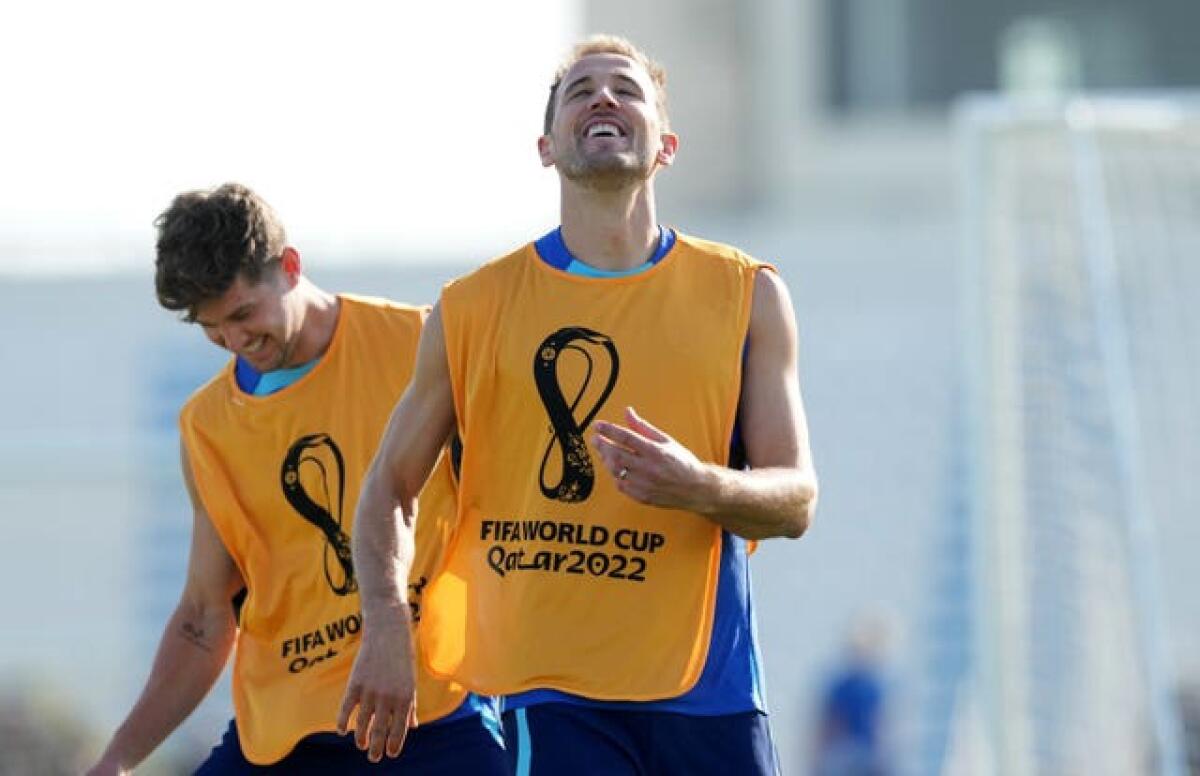 England’s Harry Kane (right) and John Stones during a training session