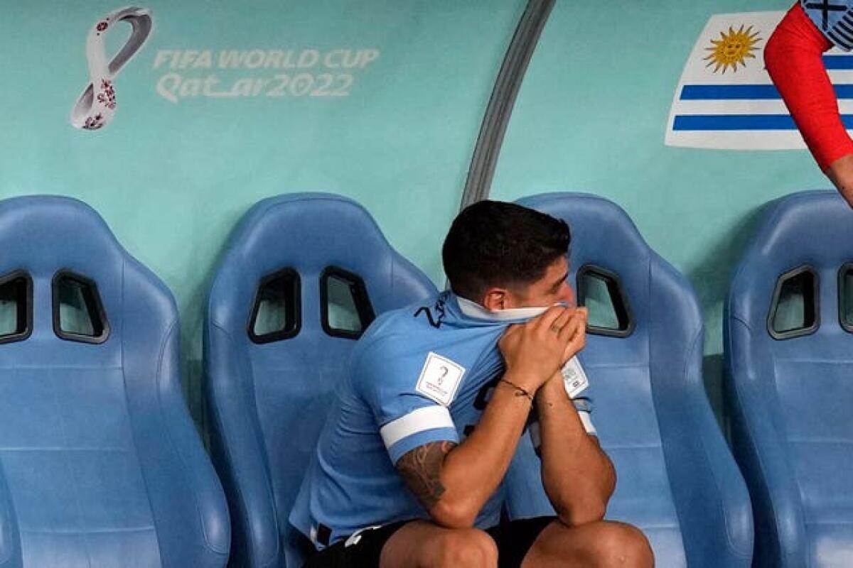 Uruguay’s Luis Suarez in tears on the substitutes bench