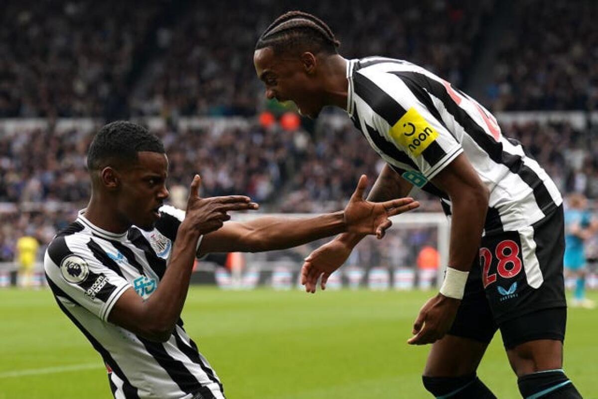 Alexander Isak, left, celebrates scoring Newcastle's fourth goal with team-mate Joe Willock during their 6-1 demolition of Tottenham. The Magpies raced into a remarkable five-goal lead inside 21 minutes at St James’ Park, with Isak claiming a double. A thumping victory for Eddie Howe's side propelled them towards Champions League qualification at the expense of stunned Spurs. Tottenham chairman Daniel Levy responded to the heavy loss by sacking temporary boss Cristian Stellini, just four games after he took over from Antonio Conte