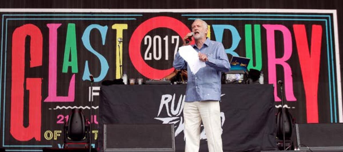 Labour leader Jeremy Corbyn speaks to the crowd from the Pyramid stage at Glastonbury in 2017