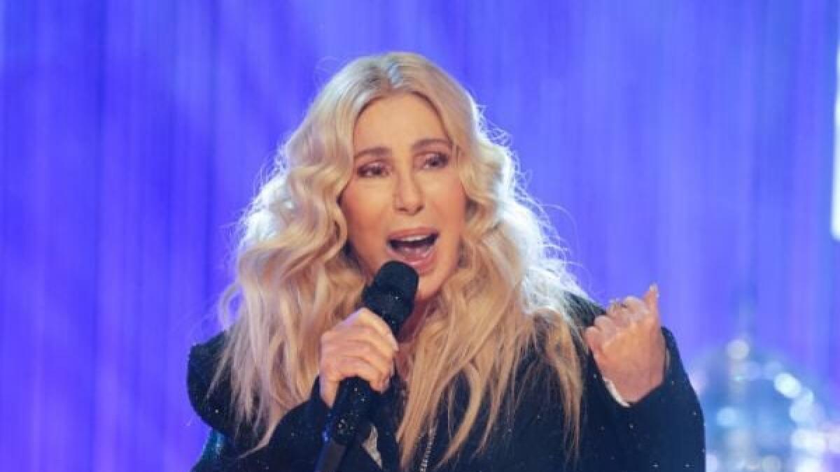 Cher says she is ‘least diva-like person’ and gives biopic update