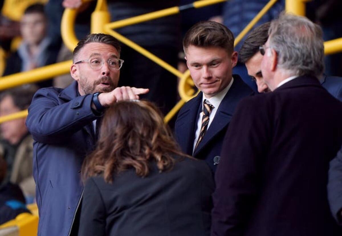 Luton manager Rob Edwards, left, watches on at Molineux